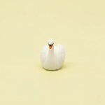 Miniature Swan Assorted (1Pc) on a light cream background.
