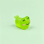 Miniature Glow Cute Resin Frog Assorted (1pc) displayed on a mint green background