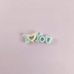 Miniature I Love You Toys (1pc) on the light background.