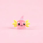 Miniature Glow Axolotl Fish Assorted (1pc) displayed on a light pink background