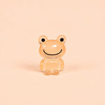Miniature Glow Frog Assorted (1pc) displayed on a peach background