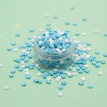 Miniature Polymer Clay SnowFlakes (10pcs) on the light blue background.