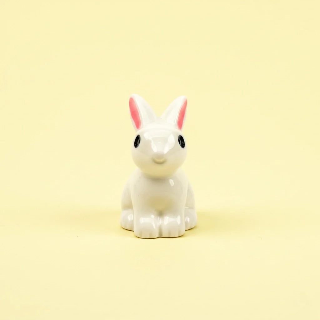 Miniature Rabbits Assorted (1Pc) on a pale yellow background.