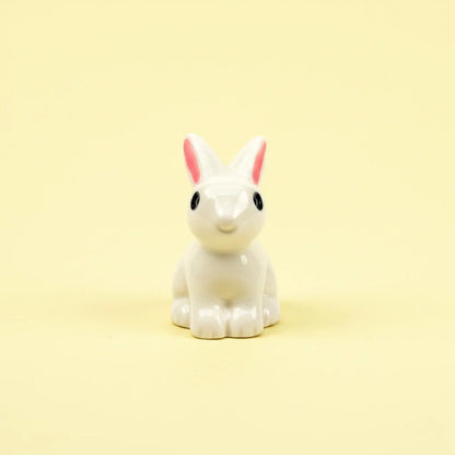 Miniature Rabbits Assorted (1Pc) on a pale yellow background.