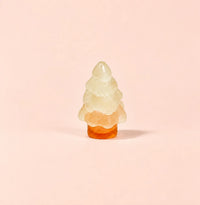 Miniature Glow Christmas Tree Assorted (1pc) displayed on a peach background