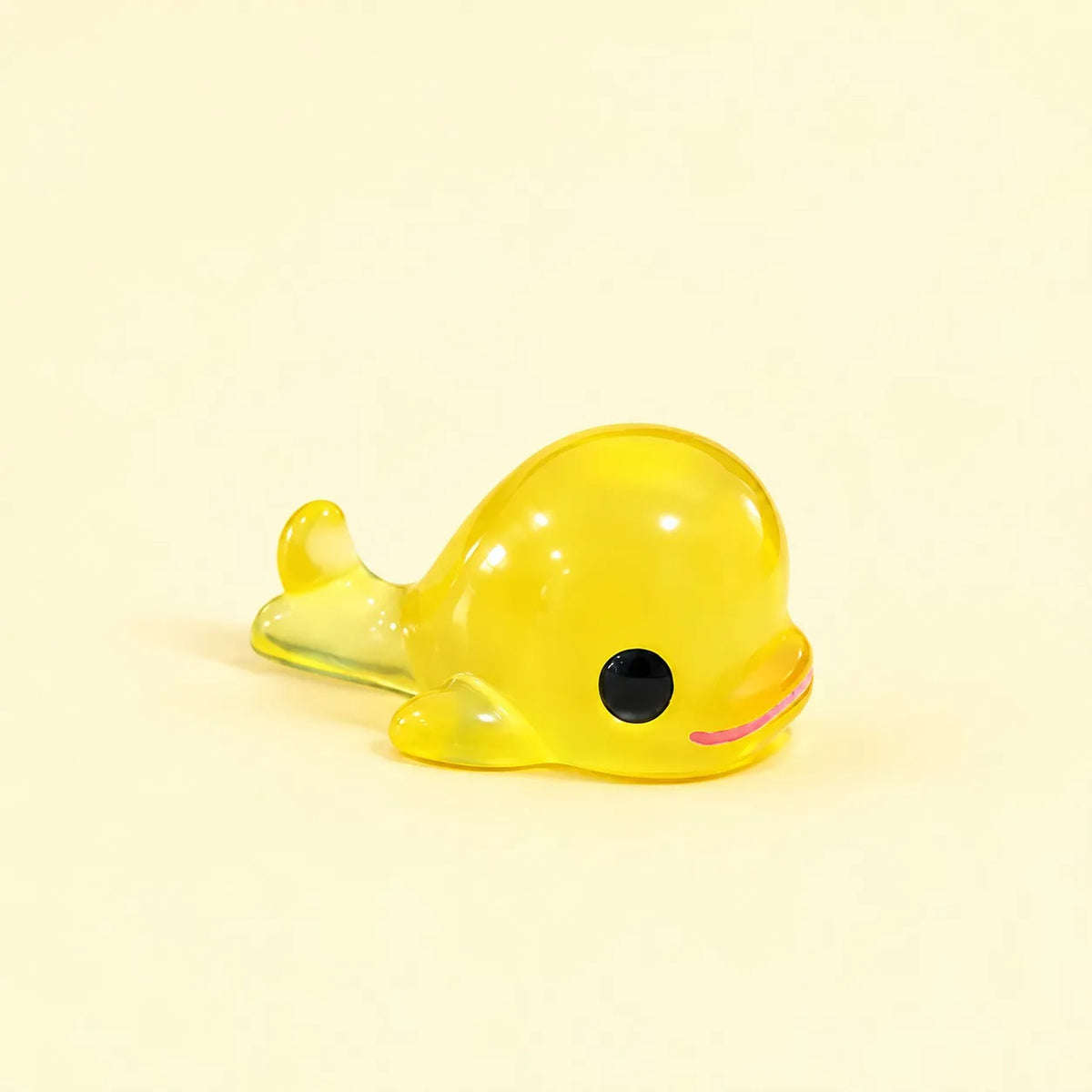 Miniature Glow Dolphin Assorted (1pc) displayed on a light yellow background