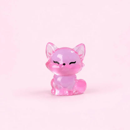 Miniature Glow Fox Assorted (1pc) displayed on a light pink background
