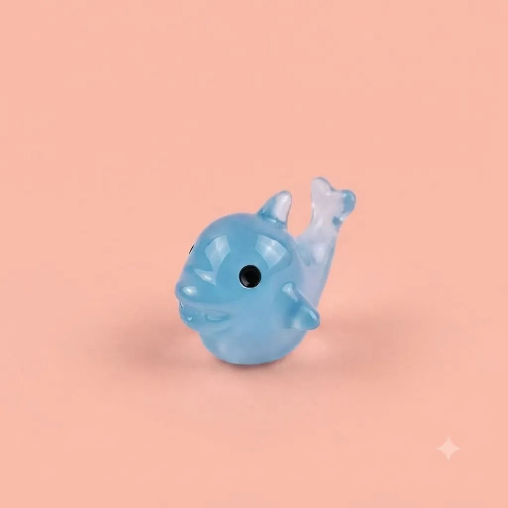 Miniature Glow Fish Assorted (1pc) displayed on a peach background