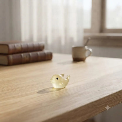 Miniature Glow Fish Assorted (1pc) displayed on a wooden table near a window