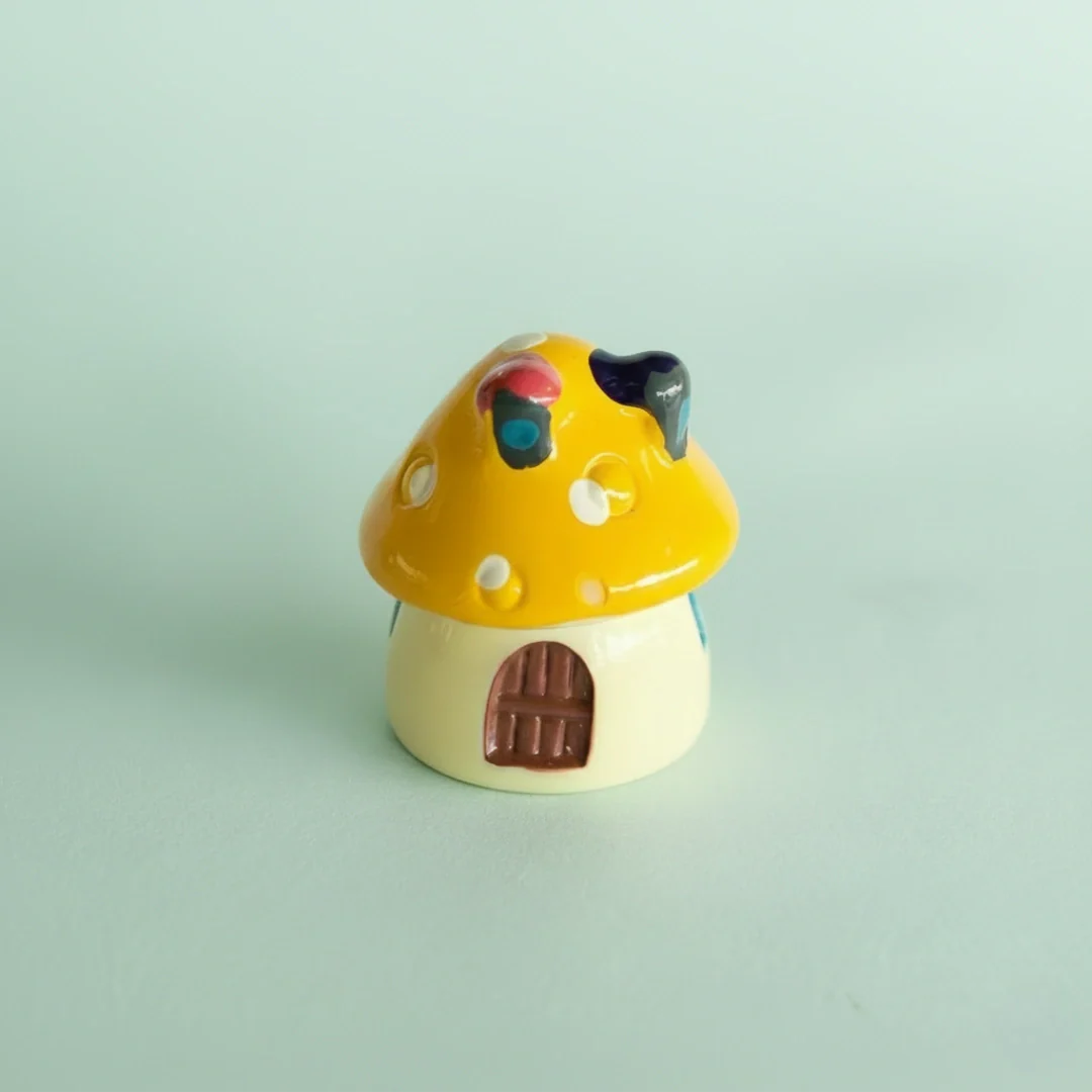 Miniature Mushroom House Assorted on the light background.
