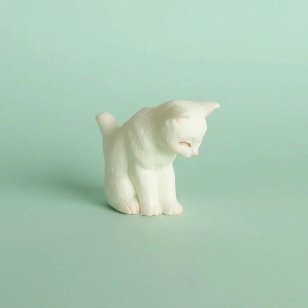 Miniature Toy Cat Assorted (1Pc) on a light mint green background.