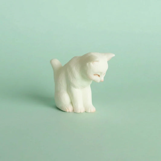 Miniature Toy Cat Assorted (1Pc) on a light mint green background.