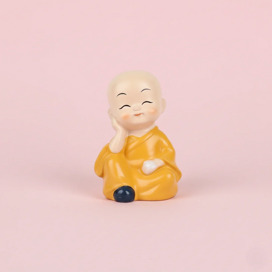 Miniature Monks Assorted (1pc) displayed on a pink background