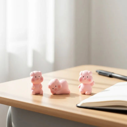 Miniature Cute Piglet Assorted (1pc) displayed on a wooden table near a window