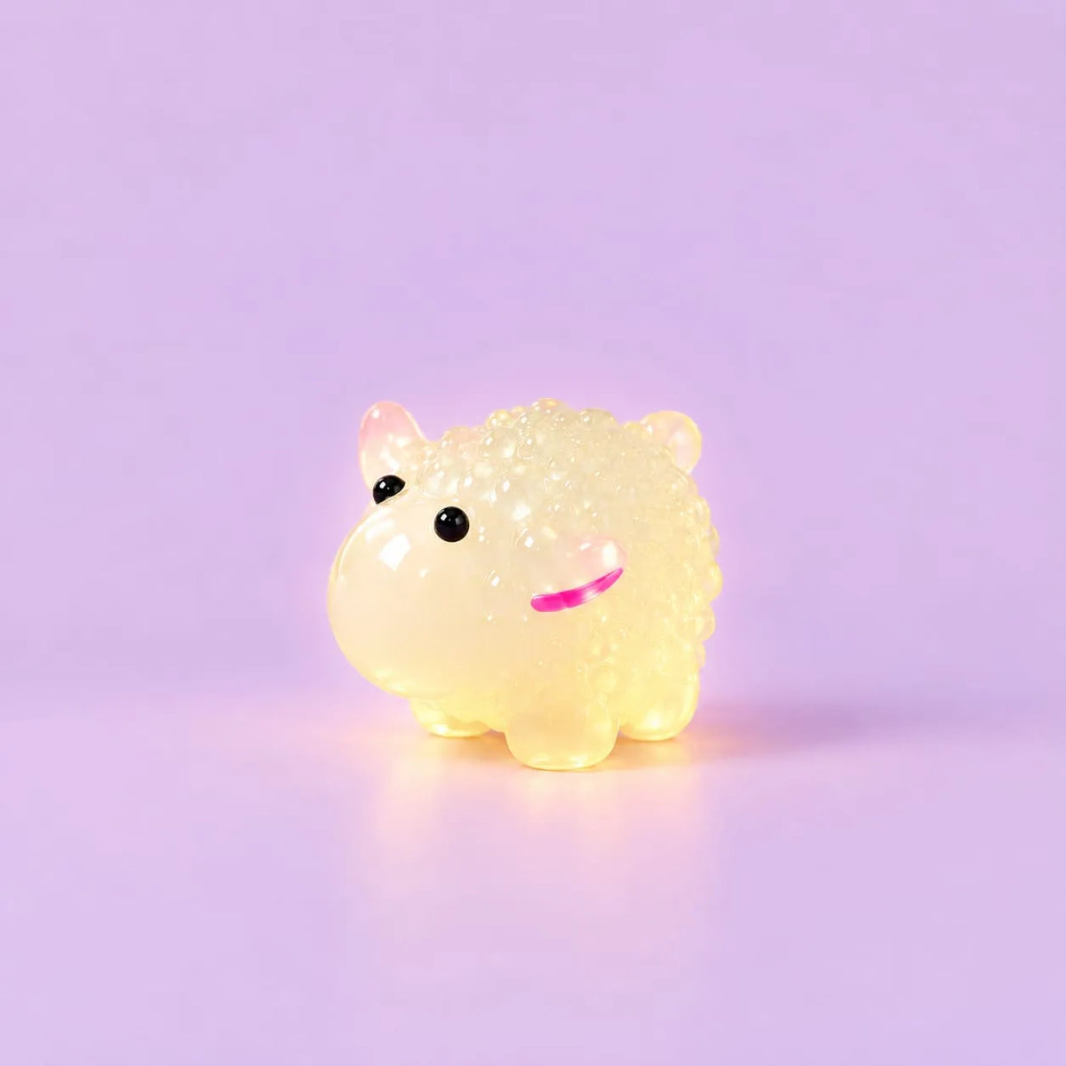 Miniature Glow Sheep Assorted (1pc) displayed on a light purple background