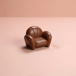 Miniature Leather Sofa Assorted (1pc) displayed on a pink background