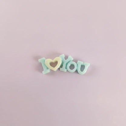 Miniature I Love You Toys (1pc) on the light background.