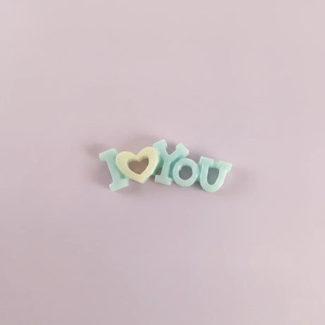 Miniature I Love You Toys (1pc) on the light background.