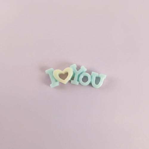 Miniature I Love You Toys (1pc) on the light background.