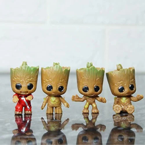 Miniature Groot collection on the glass floor.