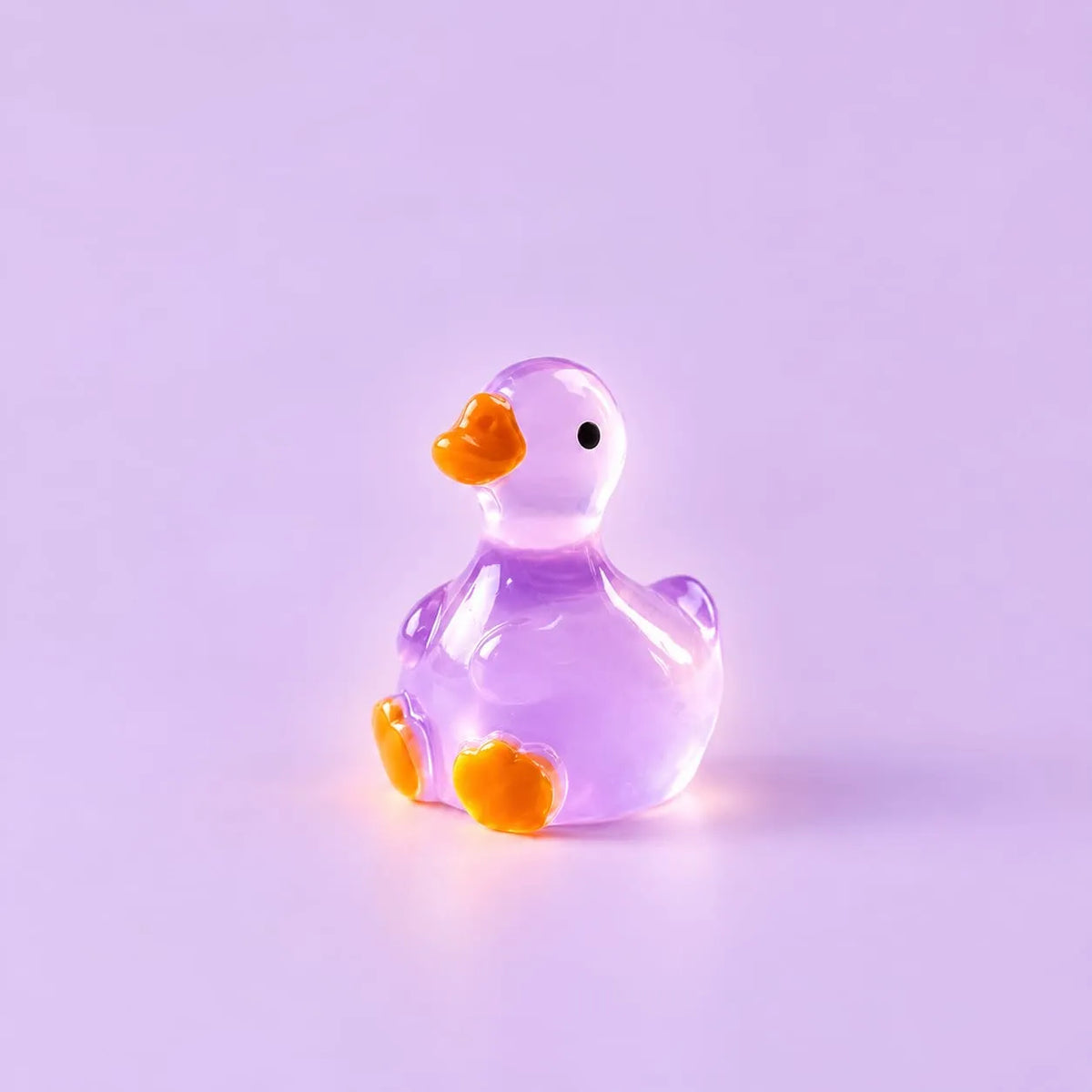 Miniature Glow Cute Duck Assorted (1pc) displayed on a light purple background