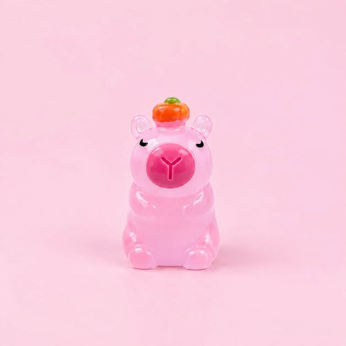 Miniature Glow Cute Pig Assorted (1pc) displayed on a pink background