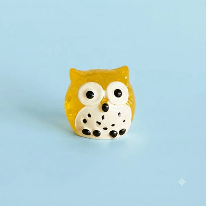 Miniature Glow Owl Assorted (1pc) displayed on a light blue background
