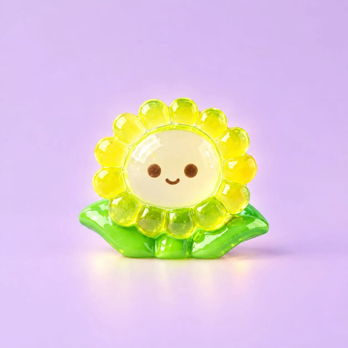 Miniature Glow Sunflower Assorted (1pc) displayed on a light purple background