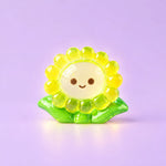 Miniature Glow Sunflower Assorted (1pc) displayed on a light purple background