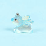 Miniature Glow Unicorn Horse Assorted (1pc) displayed on a light blue background