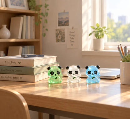 Miniature Glow Panda Assorted (1pc) displayed on a wooden table with other miniatures