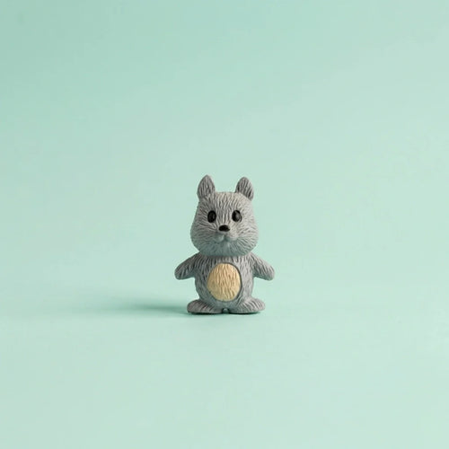 Miniature Squirrel Assorted (1Pc) on a light mint green background.