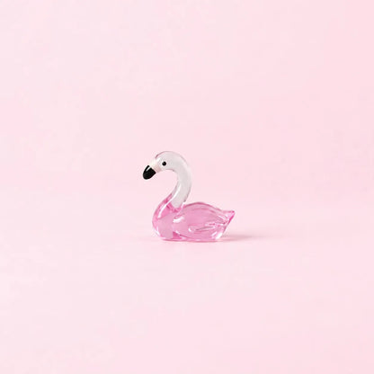 Miniature Glow Swan Assorted (1pc) displayed on a light pink background
