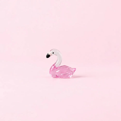 Miniature Glow Swan Assorted (1pc) displayed on a light pink background