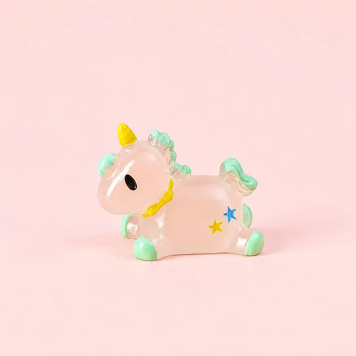 Miniature Glow Unicorn Assorted (1pc) displayed on a light pink background